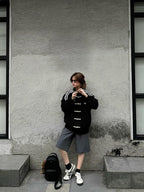 Black CNY suede knot jacket with oversized unisex streetwear design