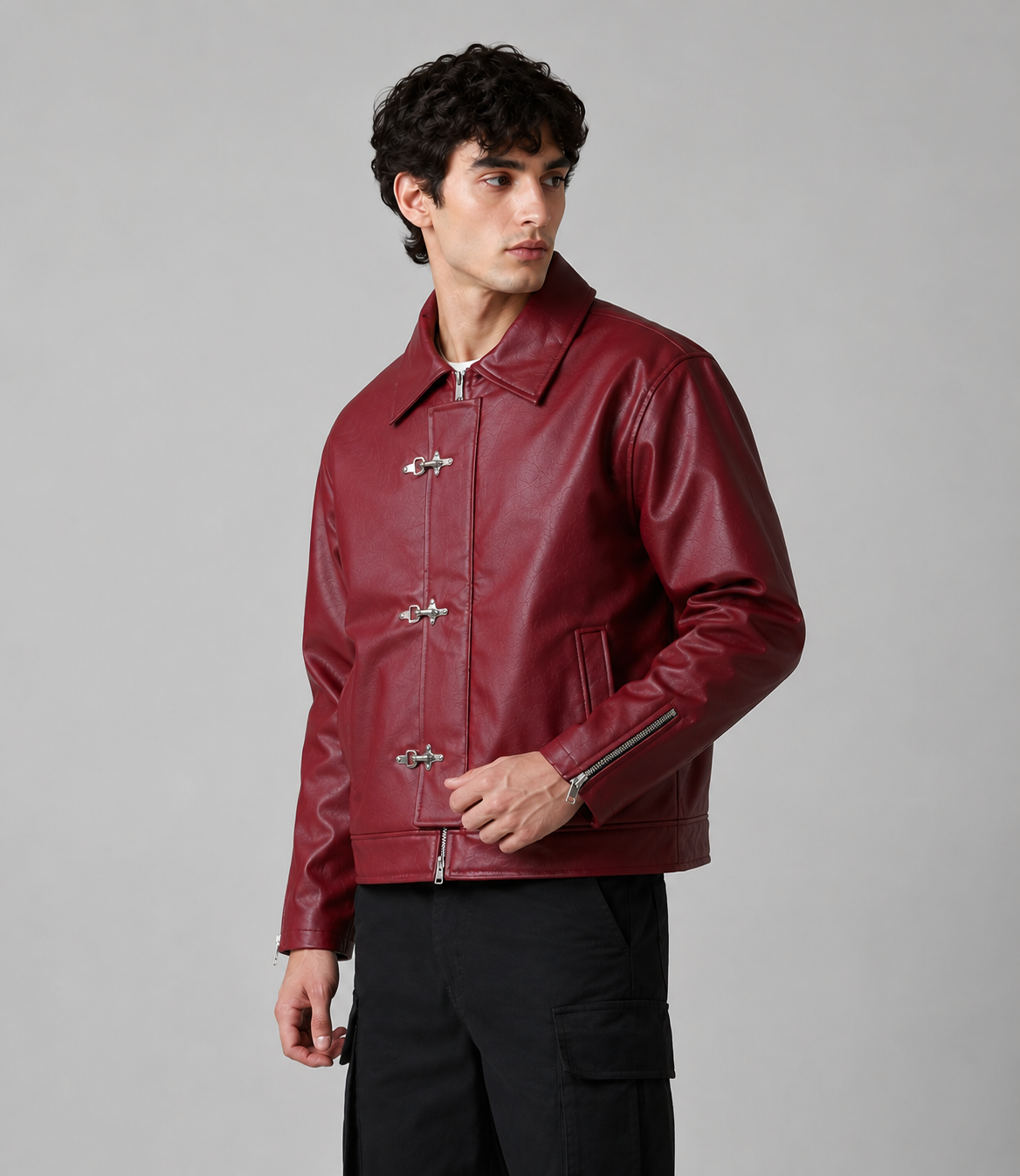 Side angle of burgundy jacket by WesternVibe showing metal clasps and sleeve zipper details